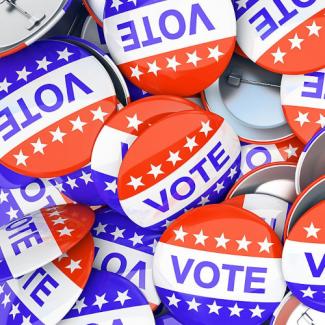 Red, white, and blue VOTE pins 